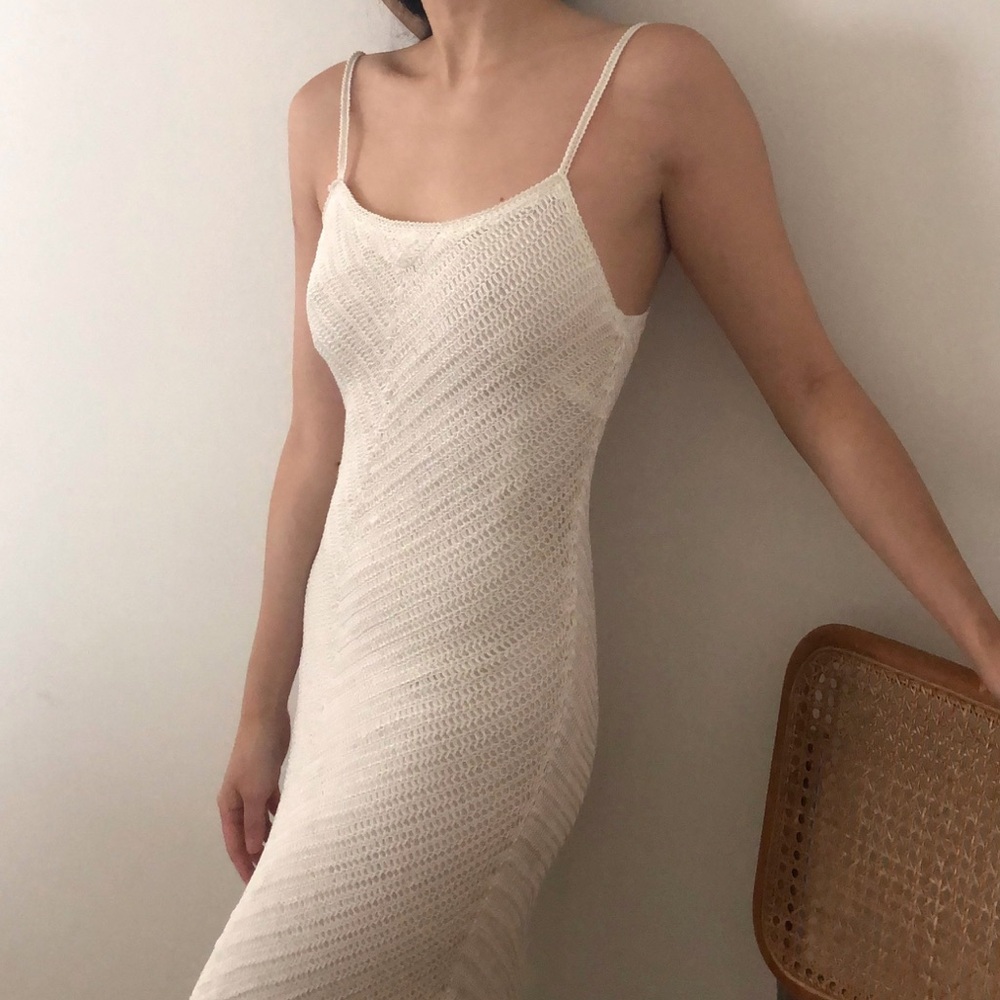 Slinky knitted body con ivory dress with fringe